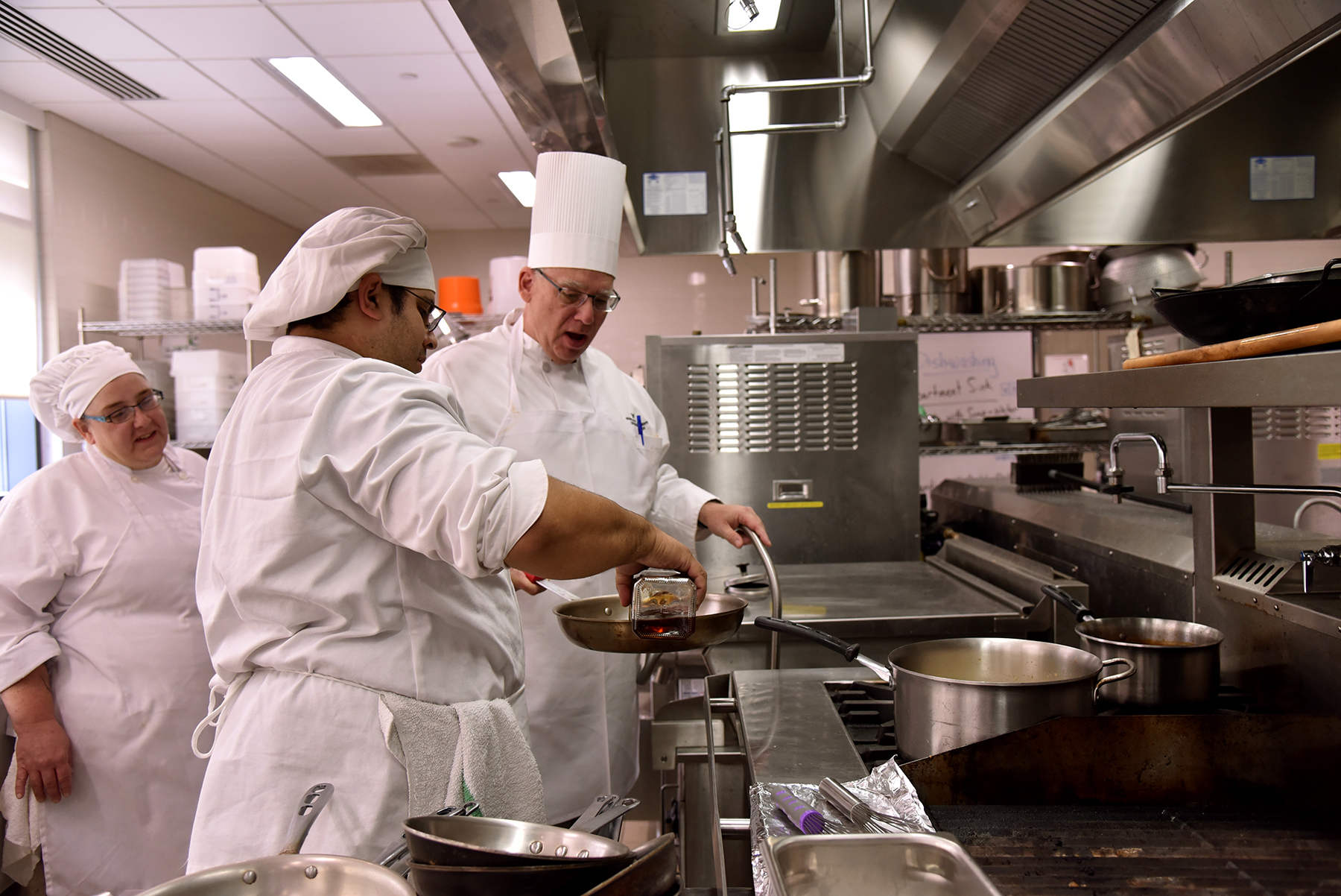 Image of students and faculty working in MVCC kitchens