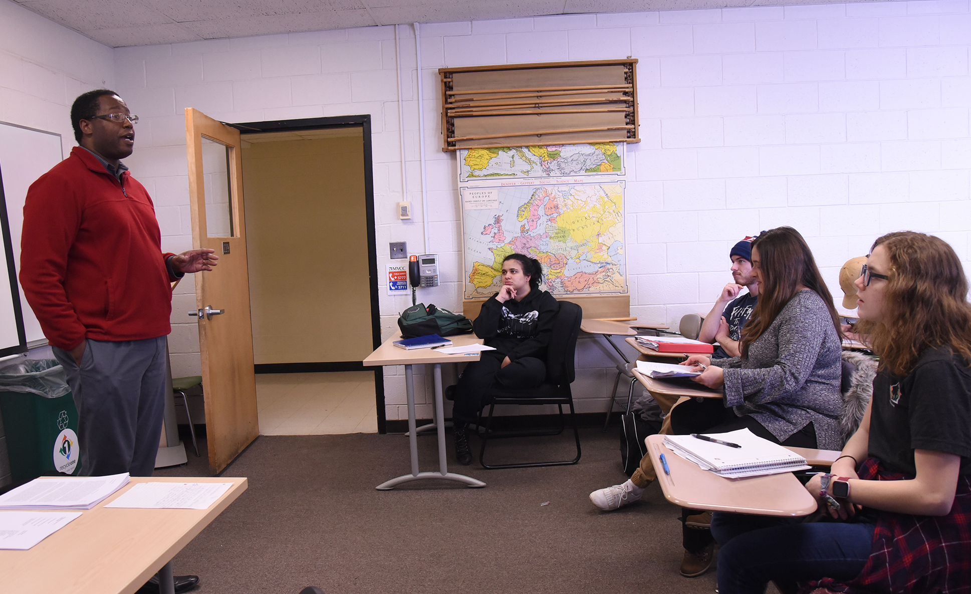 Professor talking to students in class