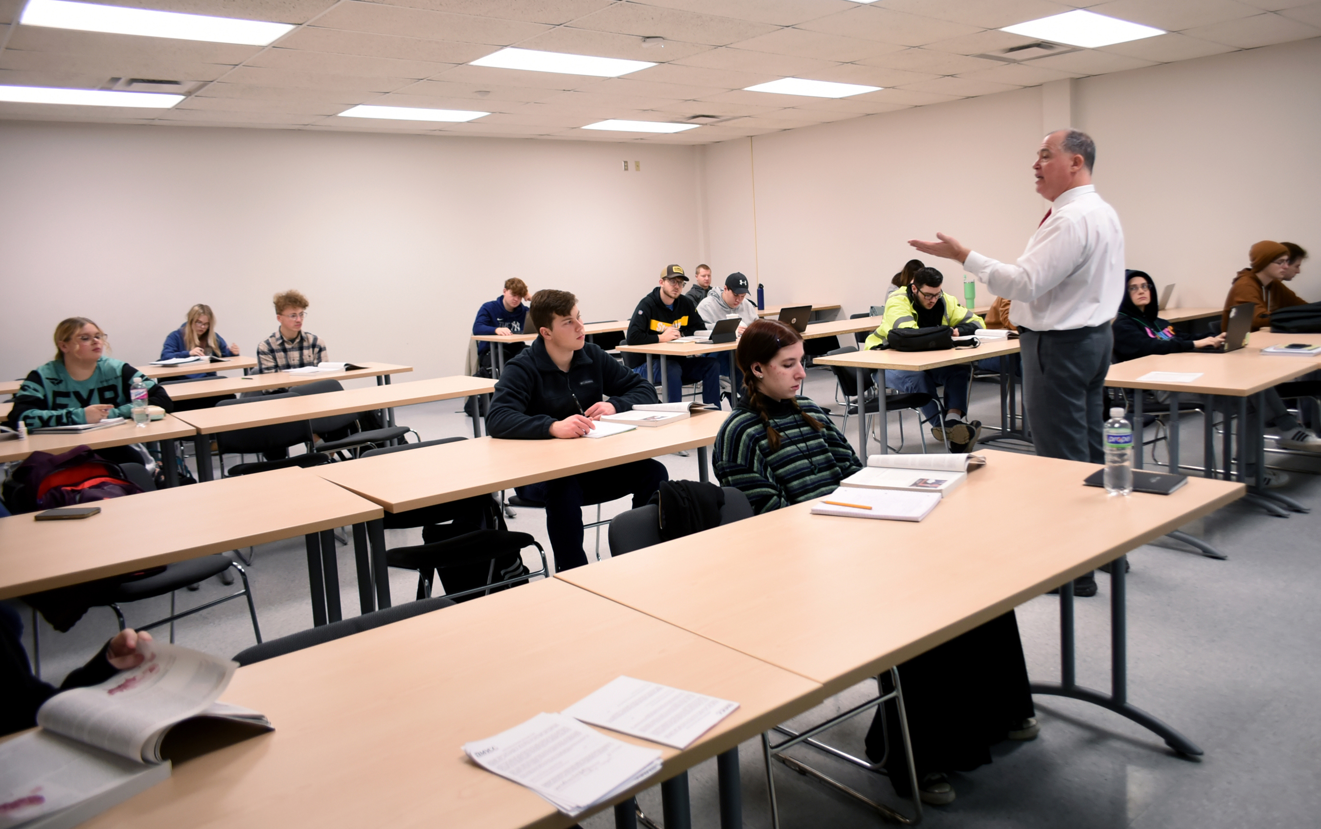 Professor standing in front of classroom of students