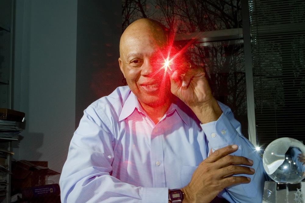 Image credit GE; inventor and engineer Dr. Marshall Jones holding laser