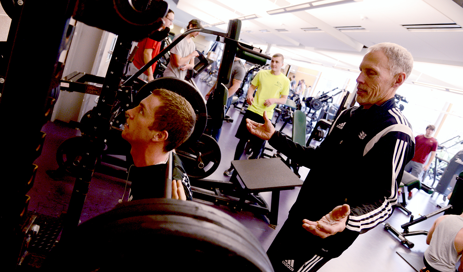 Coach Gould instructing students in the Fitness Center