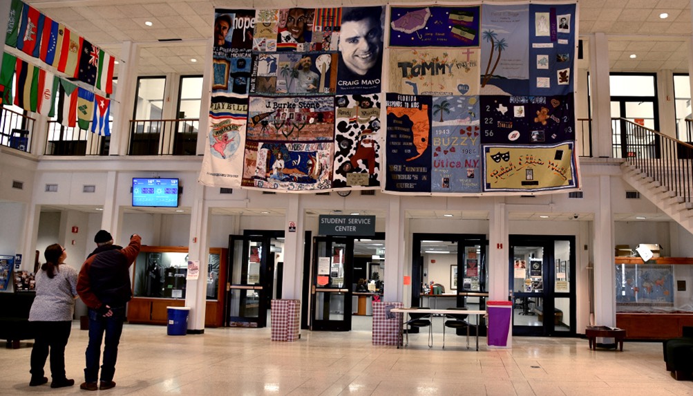 Image of AIDS Memorial Quilt on display at MVCC in Utica