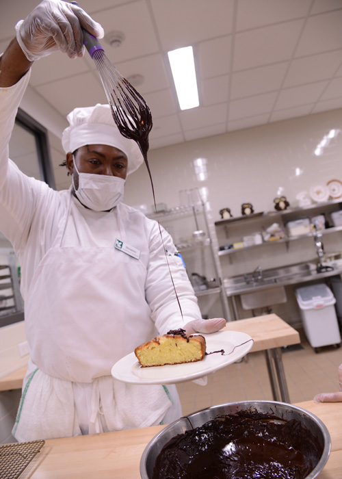 student working on a pastry project